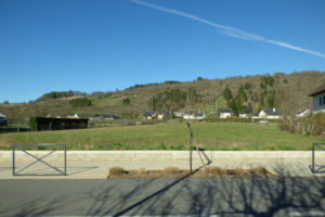 SAINT COME D'OLT, terrain plat de 1500m2 proche centre ville