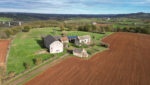 Ensemble Immobilier composé d'un corps de ferme et de 26 hectares de terrain