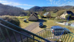 ESTAING, Immeuble de rapport de 2 logements, loués avec terrain et garage.